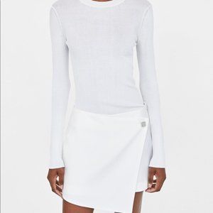 Zara skort with a silver button detail